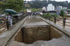 Nepal closes schools as deaths from flooding and landslides reach at least 193